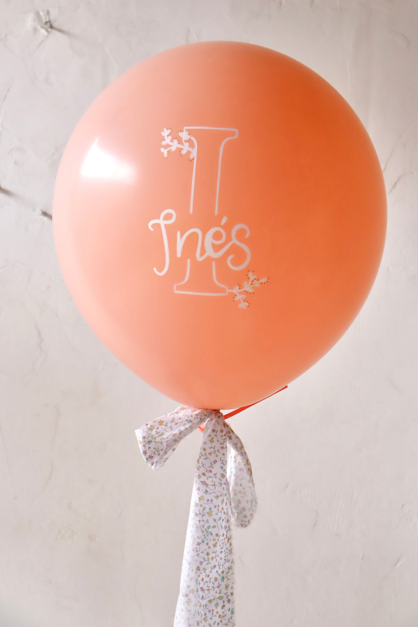 Globo L con inicial y nombre