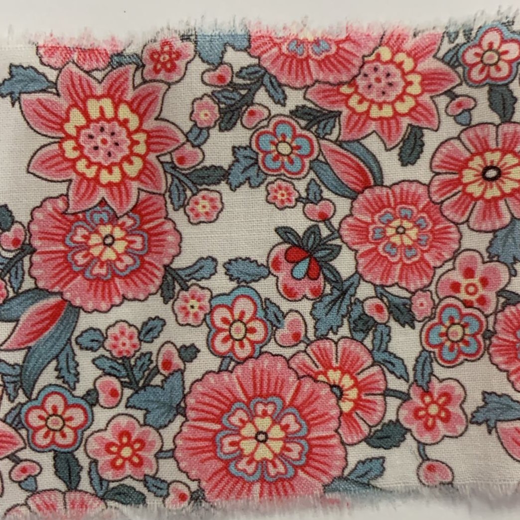 Lazo de tela con flores fucsia