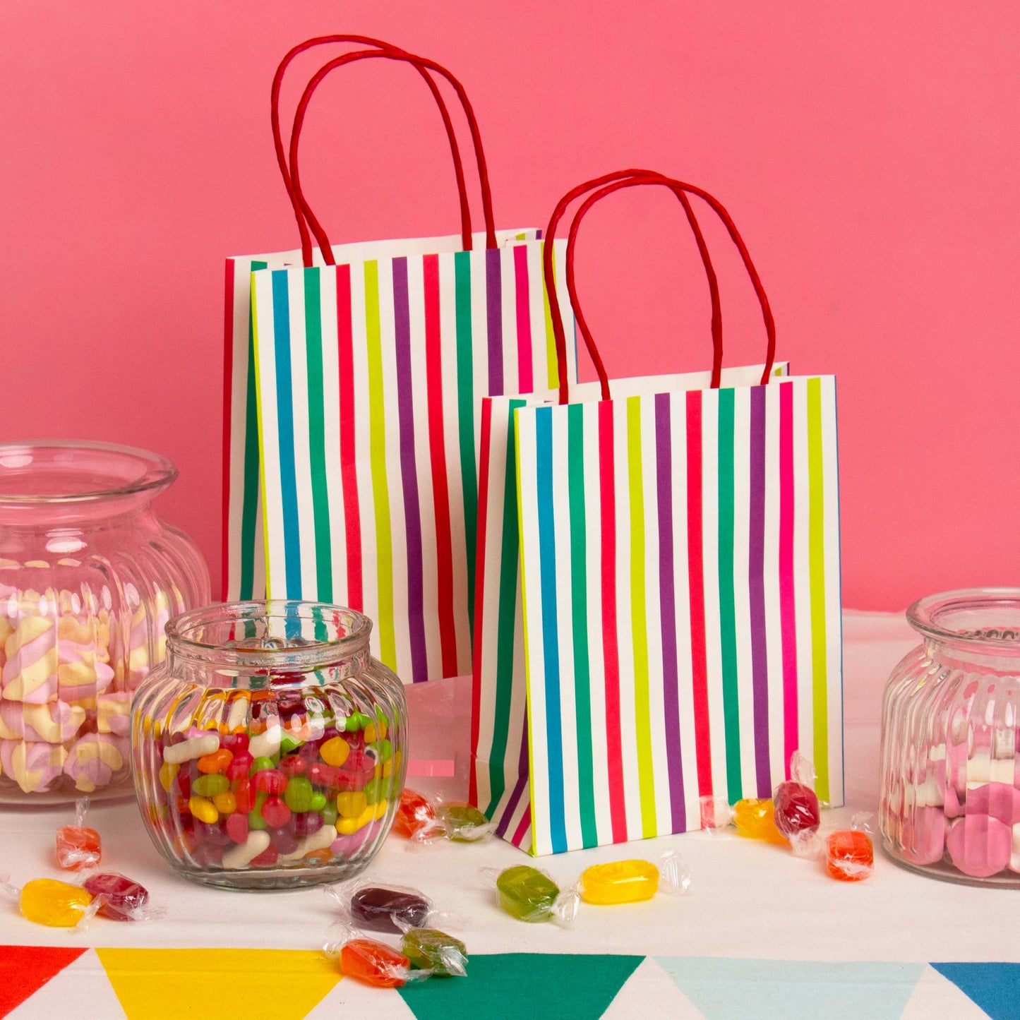 Bolsas de regalo con rayas de arcoíris para fiestas- pack 8 uds.